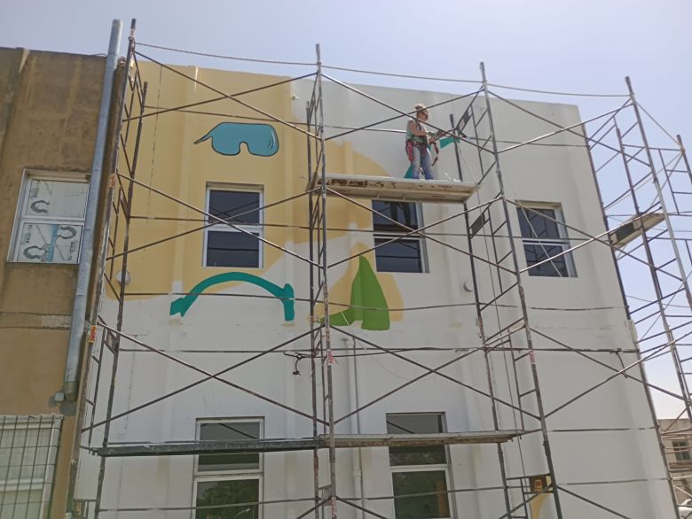 A 15 años de las explosiones de la Planta Piloto, realizan un mural simbólico en el campus